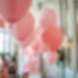 An elegant display of blush pink balloons at a sophisticated event