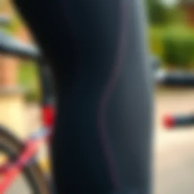 Detailed view of stitching and fit features on bike riding tights