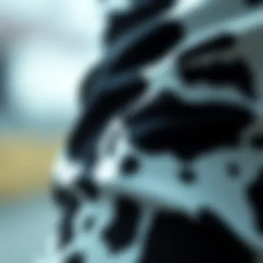 Detailed View of Cow Print Fabric Close-up of cow print fabric showcasing texture and pattern