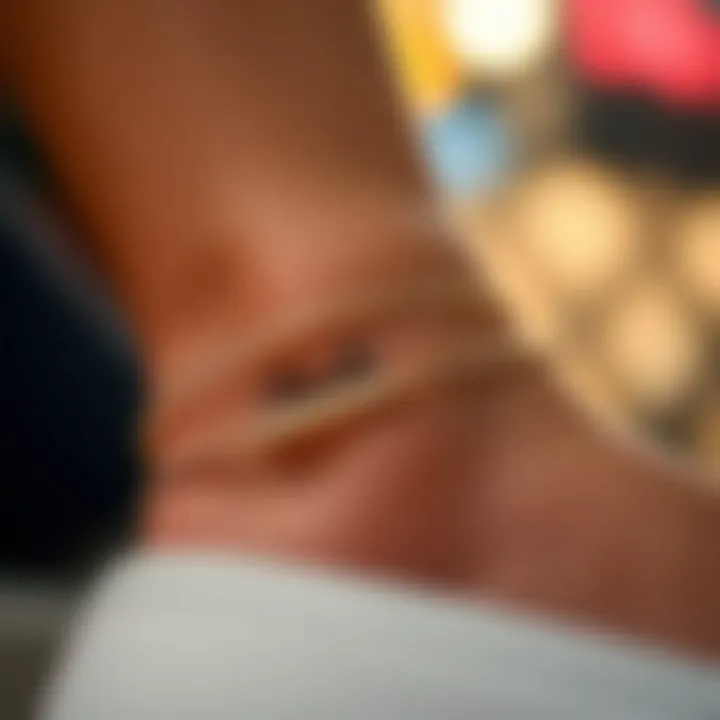 Close-up of personalized engraving on a fashionable ankle bracelet