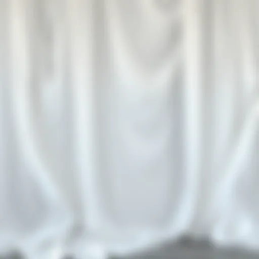 Fluidity of White Draping Fabric Elegant draping showcasing the fluidity of white fabric in a fashion setting