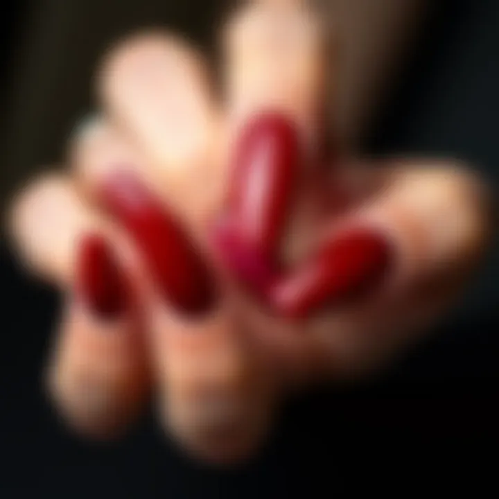 Diverse Shapes of Dark Red Nail Designs A collection of dark red fake nails displayed in various shapes.
