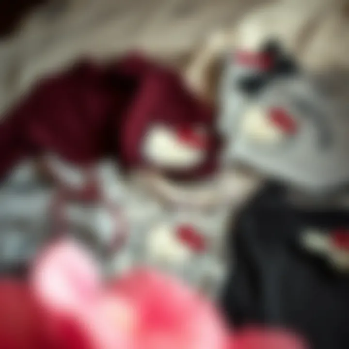 An artistic arrangement of Hello Kitty shirts laid out in different styles.