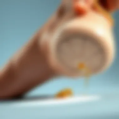 Heel Scrubber Stone in Action Close-up of a heel scrubber stone in use on a foot.