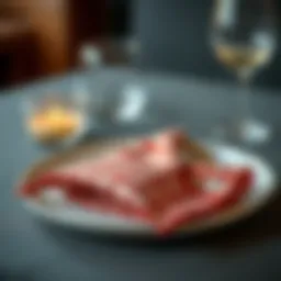 Elegant checkered cloth napkin folded on a dining plate