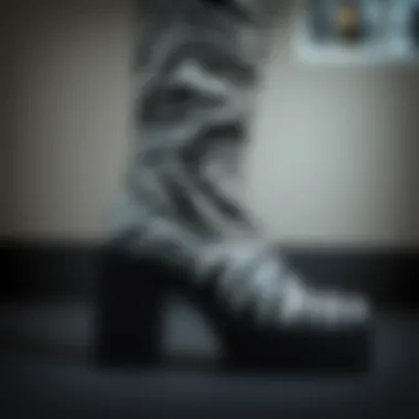 Intricate Zebra Print Detail A close-up view showcasing the intricate zebra print pattern on platform boots