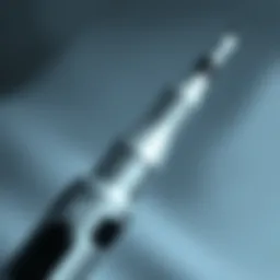 Close-up of a microcurrent facial wand demonstrating its sleek design and technology.