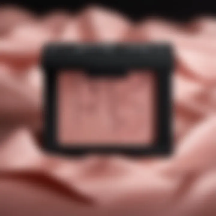 Close-up of NARS Rose Blush compact revealing its luxurious packaging and brand logo