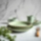 Elegant sage green dessert plate set against a marble backdrop
