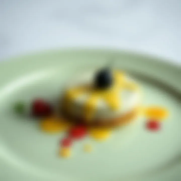 Close-up of delicately plated dessert on a sage green plate