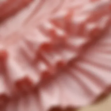 Close-up of delicate frill detailing on swimwear fabric