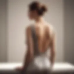 Elegant plunging backless dress showcased on a mannequin