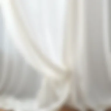 The Grace of Draped Sheer Elegant draping of white sheer fabric