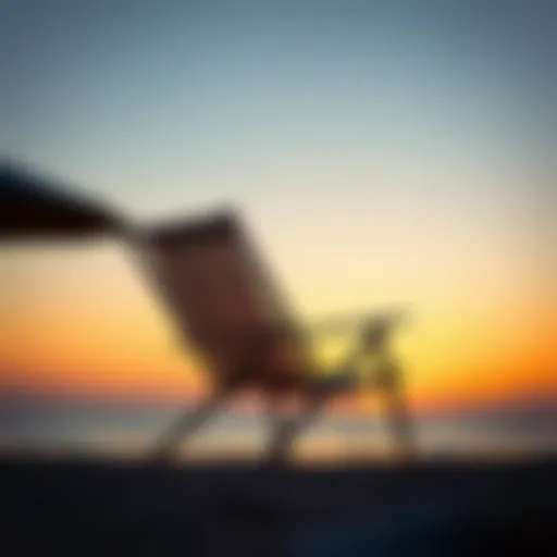 A stylish beach backrest chair set against a sunset